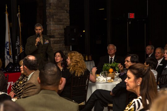 Brig. Gen. John W. Bullard expresses his appreciation for the volunteers from the surrounding community during this year’s Camp Pendleton Armed Forces YMCA Board Installation and Volunteer Recognition Dinner by marching on the colors at the Pacific Views Event Center, Jan 24. The dinner honors Pendleton’s volunteers, and awards civilian and military volunteer of the year, and volunteer unit of the year. Bullard is the commanding general of Marine Corps Installation West, Marine Corps Base Camp Pendleton.