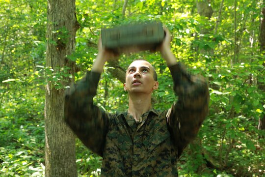 A Navy Junior Reserve Officers' Training Corps cadet completes an ammo can lift during an endurance course aboard Marine Corps Base Camp Lejeune, June 17. The cadets participated in a week-long exercise to experience the different aspects of the Corps.