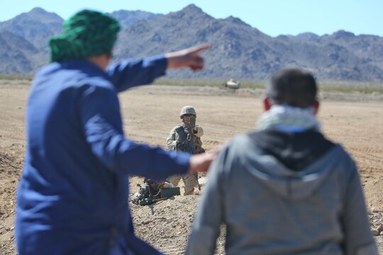 Marines with Engineer Support Company, Combat Logistics Battalion 1, Combat Logistics Regiment 1, 1st Marine Logistics Group, halt role-players during the Marine Readiness Exercise aboard Marine Corps Air Ground Combat Center Twenty-nine Palms, Calif., March 25, 2014. The MRX is part of the month-long Integrated Training Exercise 3-14 that prepares the battalion for its role as the logistics combat element in the final combat deployment in support of Operation Enduring Freedom.