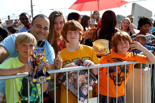 Sgt. Ricardo Cedeno and his family brought posters and toys to be signed by Dwayne "The Rock" Johnson at the base theater July 24.

Johnson visited Camp Pendleton for a screening of his new movie "Hercules" and to conduct a meet and greet with fans.