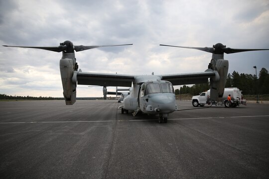 Two MV-22B Ospreys with Marine Medium Tiltrotor Squadron (VMM) 166 get refueled before continuing a training exercise at the Grand Canyon, July 24. The Grand Canyon was the turning point during the exercise with VMM-166.