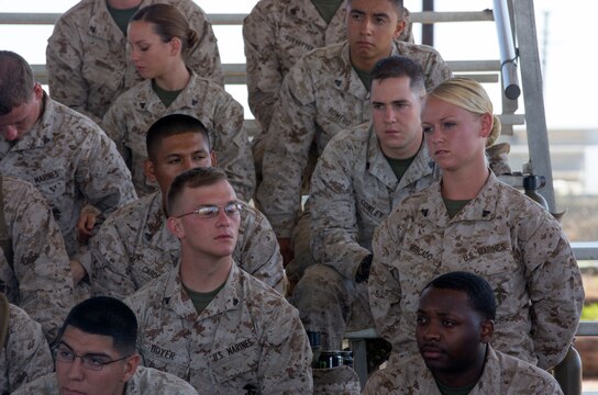 Cpl. Jordan Mercado, a newly promoted corporal and an expeditionary airfield system technician with Headquarters and Headquarters Squadron, asks a question during a question and answer portion of a three-day Committed and Engaged Leadership Indoctrination Course aboard Marine Corps Air Station Miramar, Calif., June 3-5. Newly promoted corporals from 3rd Marine Aircraft Wing and the air station were invited to come and learn what it means to be a noncommissioned officer and about their new responsibilities.