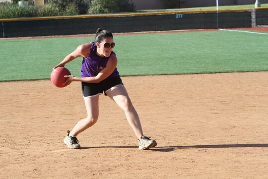 Randall Cobb, family readiness officer with Marine Heavy Helicopter Squadron (HMH) 465, pitches during a kickball tournament aboard Marine Corps Air Station Miramar Calif., June 14. The tournament was part of the Committed and Engaged Spouses’ Sports League. The Committed and Engaged Spouse initiative, started by 3rd Marine Aircraft Wing Commanding General Maj. Gen. Steven Busby, highlights the service and sacrifice of military spouses, and works to develop opportunities to engage the community in camaraderie.