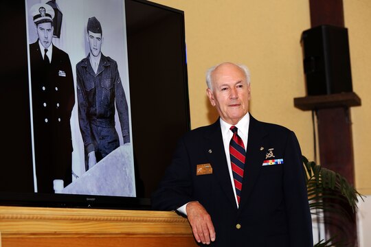 John R. Caruso reminisces about his brother’s life and service after viewing a photo of him, Sgt. Matthew Caruso, at the rededication of the Caruso Chapel, located at the School of Infantry-West, here, June 23.

The chapel was initially dedicated to Caruso in 1953 and he was awarded the Silver Star Medal in 1950 for shielding Connie Griffin, a chaplain then assigned to the 7th Marine Division (reinforced), from enemy fire with his body during an ambush in the Korean War, Dec. 6, 1950.

“There went a father, a husband, a brother, and it affected a lot of people.” John said with tears in his eyes. “He was a good brother, but [this is] something Marines do.”

