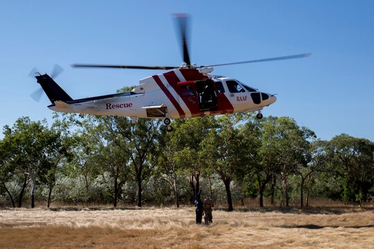 A Sikorsky S-76 search-and-rescue helicopter prepares to extract medical personnel during a SAR training exercise aboard Royal Australian Air Force Base Tindal, Australia, during Exercise Southern Frontier 2014, June 5. Southern Frontier is an annual bilateral training exercise between the RAAF and the United States Marine Corps with a primary focus on offensive air support and enhancing military interoperability.