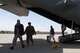 Afghan National Army soldiers exit an Afghan Air Force C-130 Hercules March 10, 2014, on arrival to Kandahar Air Field, Afghanistan. U.S. Air Force airmen from the 438th Air Expeditionary Wing/NATO Air Training Command-Afghanistan flew an advisory mission with an AAF aircrew to further increase their operational capability of the AAF. (U.S. Air Force photo by Tech. Sgt. Jason Robertson/Released)