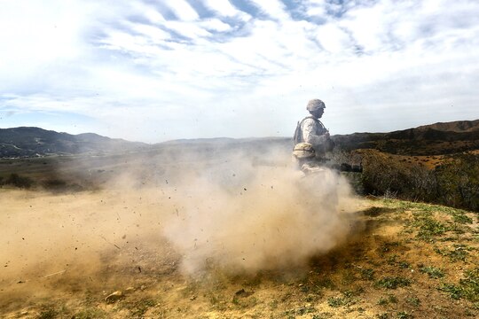 Marines with Alpha Company, 7th Engineer Support Battalion, 1st Marine Logistics Group, fire a Shoulder-launched Multipurpose Assault Weapon during a live-fire range and competition aboard Camp Pendleton, Calif., March 11, 2014. Eight squads, of approximately 80 Marines and sailors, from Alpha Company participated in the weeklong competition that focused on infantry rifle squad skills, tested small-unit leadership and their combat-readiness. (U.S. Marine Corps photo by Cpl. Timothy Childers / Released)