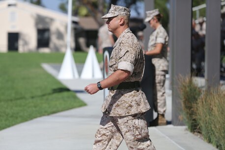 1st Transportation Support Battalion, Commanding Officer Lieutenant Colonel Thomas M. Warren, marches out to take his position in the reviewing area during 1st Transportation Support Battalion’s activation ceremony held aboard Camp Pendleton, California, 1 October 2014.