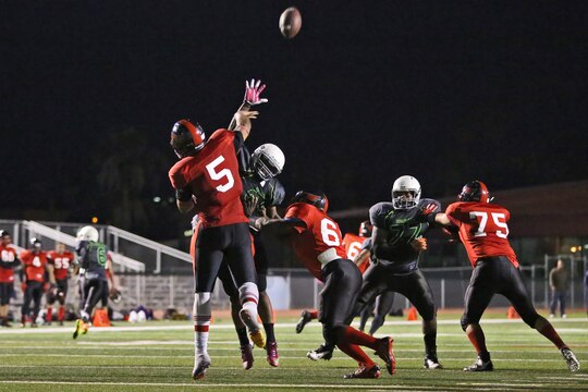 The Headquarters and Support Battalion Spartans claimed a hard fought victory against the Miramar Falcons, winning 7-0 during the Commanding General’s Cup Football Tournament Semi-Finals at the Paige Fieldhouse here, Nov. 4. The victory in overtime earned them a spot in the championship game against 1st Light Armored Reconnaissance Battalion Highlanders. (Photo by Cpl. Shaltiel Dominguez)