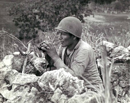 Carl Gorman, lied about his age when he enlisted at 35-years-old. One of the original 29 who helped develop the code, Gorman served in combat in the Pacific, from Guadalcanal to Saipan. After receiving an honorable discharge in 1945, he became a successful artist and teacher. Eventually, he became the director of the Navajo Arts and Crafts Guild as well as the president of the Code Talker Association . 

The Navajo code talkers were considered to be unsung heroes of World War II.
The Navajo code, with its complex and irregular syntax and lack of an alphabet remained unbroken and was considered so valuable that they were not allowed to talk about it until 1969 . They were responsible for transmitting information on tactics, troop movements, orders and other vital battlefield information.

