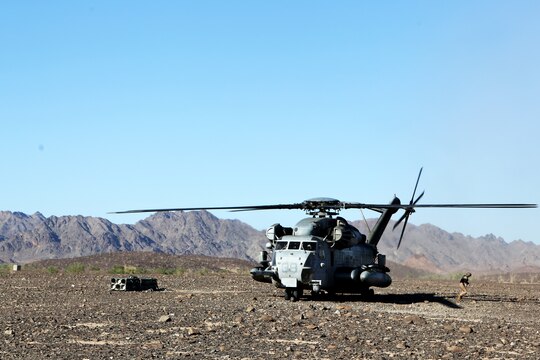 A CH-53E Super Stallion with Marine Heavy Helicopter Squadron (HMH) 462 prepares to take off before conducting external lifts with Combat Logistics Battalion (CLB) 13 aboard Marine Corps Air Station Yuma, Ariz., Oct. 23. The training allows the Marines to receive sufficient training connecting and disconnecting cargo.