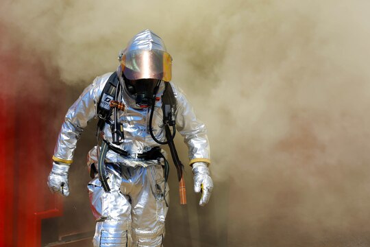 Gunnery Sgt. Jhimelle Sepulveda, training chief with a fire fighting unit here, emerges from a fire training facility during an exercise conducted by the Camp Pendleton Fire Department and the Marine Corps Air Station Camp Pendleton’s Aircraft Rescue Fire Fighting unit on a controlled burn training facility at the 25 Area here.
The training was designed to teach firefighters how to prevent rapid combustion of burned materials in rooms and structures.
"This is good training because we don't normally get to experience this type of situation when dealing with burning aircraft," said Sepulveda.
