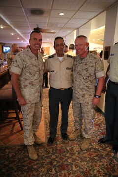 Major Gen. Vincent A. Coglianese, 1st Marine Logistics Group commanding general, Brig. Gen. Leonardo Pinto Morales, commander of the 7th Division of the Colombian Army, and Maj. Gen. Lawrence D. Nicholson, 1st Marine Division commanding general, pose for a picture as part of the Colombian Observance Exchange Program Sept. 2, 2014, aboard Camp Pendleton, Calif. More than thirty officers from the Colombian School of Advanced Warfighting visited 1st MLG to allow members of both the U.S. Marine Corps and Colombian Armed Forces to build an understanding of services, share techniques and tactics and strengthen camaraderie and interoperability. (U.S. Marine Corps photo by Staff Sgt. Lynn Kinney/released)