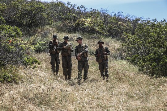 Recruits of Golf Company, 2nd Recruit Training Battalion, work together to find their next geographical point during the land navigation course at Edson Range, Marine Corps Base Camp Pendleton, Calif., March 31. Each navigation point is marked with a numbered ammunition can, and each pair of recruits was given a different route to follow. Recruits are given five points to find along the course, and while they had already plotted where each point was, they had to use what they learned to identify the correct direction. They were encouraged to use different terrain features and navigation tools to find the checkpoint. The pairs of recruits have separate responsibilities, one was responsible for a consistent pace count while the other maintained direction with the compass. Today, all male recruits recruited from recruiting stations west of the Mississippi are trained at MCRD San Diego. Today, all male recruits recruited from recruiting stations west of the Mississippi are trained at MCRD San Diego. The depot is responsible for training more than 16,000 recruits annually. Golf Company is scheduled to graduate May 8. 