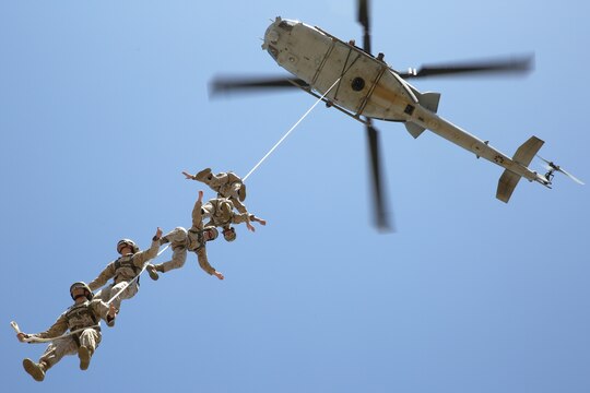 Reconnaissance Training Company Marines received an aerial view of Camp Pendleton during Special Patrol Insertion/Extraction training at San Mateo Landing Zone, April 17. The Marines, students of the Basic Reconnaissance Course, took turns being hoisted into the air by helicopter during the SPIE portion of their Helicopter Rope Suspension Training. During the course of HRST the students learn SPIE rigging, rappelling and fast rope techniques. 
