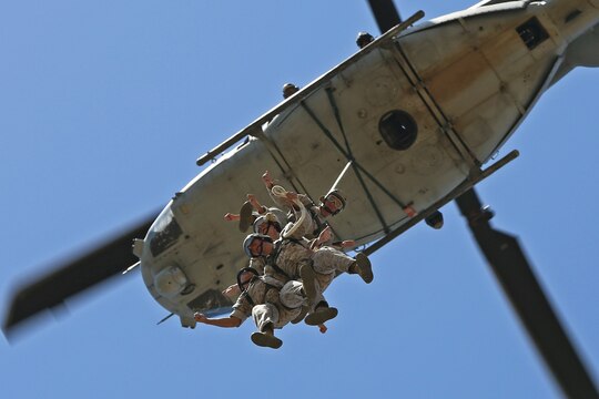 Reconnaissance Training Company Marines received an aerial view of Camp Pendleton during Special Patrol Insertion/Extraction training at San Mateo Landing Zone, April 17. The Marines, students of the Basic Reconnaissance Course, took turns being hoisted into the air by helicopter during the SPIE portion of their Helicopter Rope Suspension Training. During the course of HRST the students learn SPIE rigging, rappelling and fast rope techniques. 
