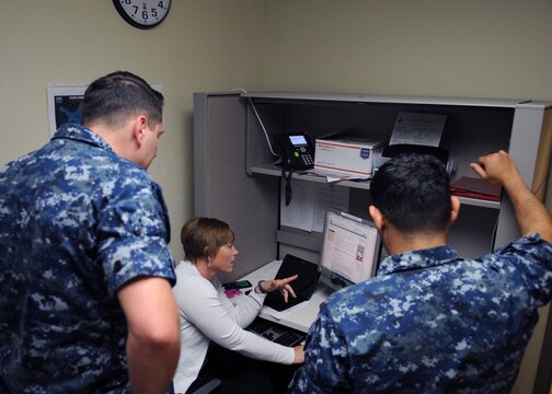 Naval Hospital Camp Pendleton Immunizations Program Nurse Manager Jennifer Holden trains corpsmen working in NHCP’s Family Medicine Clinic on where to find current CDC recommendations for child and adolescent immunizations.