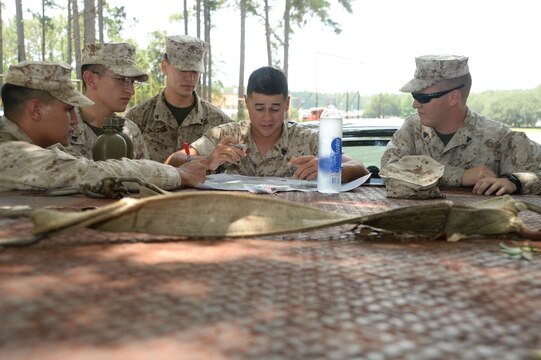 Marines taking the Corporal’s Course at Marine Corps Logistics Base Albany take to the woods with their teams, maps and compasses in search of destinations and locations during the land navigation component of the course. Active-duty and reservist corporals participated in other leadership training activities, which were held at the installation, recently.