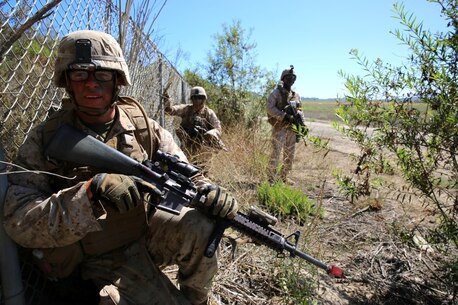 Marines with 3rd Battalion, 5th Marine Regiment, 1st Marine Division, establish security during a helicopter raid as part of the Marine Corps Combat Readiness Evaluation (MCCRE), aboard Marine Corps Base Camp Pendleton, Calif., Aug. 4, 2015. The MCCRE is used evaluate the operational readiness of a designated unit. (U.S. Marine Corps Photo by Cpl. Demetrius Morgan/RELEASED)