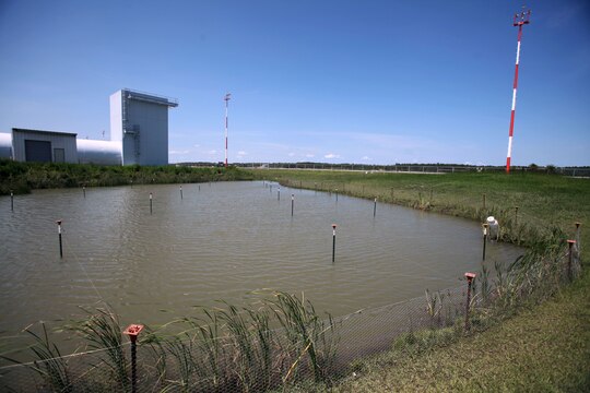 The Jet Test Cell wet detention basin provides stormwater quality and quantity control at the Jet Test Cell before being discharged to Slocum Creek at Marine Corps Air Station Cherry Point, North Carolina, July 31, 2015.