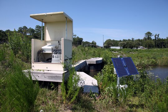 The Mill Creek stormwater monitoring outfall site is one of five outfalls that monitor the water quality at Marine Corps Air Station Cherry Point, North Carolina, July 31, 2015. Mill Creek directly discharges into Slocum Creek and is a part of the Neuse River Basin.