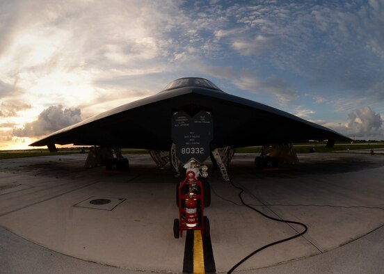 A U.S. Air Force B-2 Spirit is prepared for a mission on the flightline at Andersen Air Force Base, Guam, Aug. 12, 2015. Three B-2s and about 225 Airmen from Whiteman Air Force Base, Missouri, deployed to Guam to conduct familiarization training activities in the Indo-Asia-Pacific region. (U.S. Air Force photo by Senior Airman Joseph A. Pagán Jr./Released)