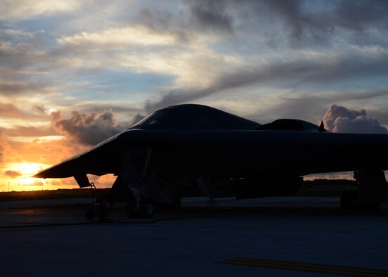 A U.S. Air Force B-2 Spirit is prepared for a mission on the flightline at Andersen Air Force Base, Guam, Aug. 12, 2015. Three B-2s and about 225 Airmen from Whiteman Air Force Base, Missouri, deployed to Guam to conduct familiarization training activities in the Indo-Asia-Pacific region. (U.S. Air Force photo by Senior Airman Joseph A. Pagán Jr./Released)