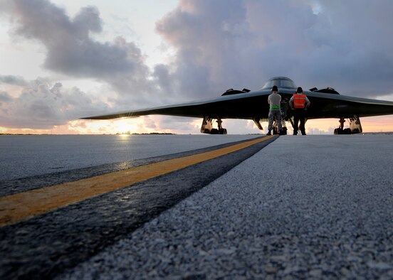 Crew chiefs assigned to the 509th Aircraft Maintenance Squadron prepare to launch a U.S. Air Force B-2 Spirit at Andersen Air Force Base, Guam, Aug. 12, 2015.  Three B-2s and about 225 Airmen from Whiteman Air Force Base, Missouri, deployed to Guam to conduct familiarization training activities in the Indo-Asia-Pacific region. (U.S. Air Force photo by Senior Airman Joseph A. Pagán Jr./Released)