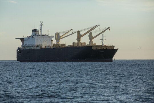 The USNS 1st Lt. Jack Lummus awaits offload during an in-stream Marine Prepositioning Force Exercise, Aug. 19, 2015. Marines with Combat Logistics Regiment 25 and sailors with Naval Beach Group 2 joined forces for the latest iteration of MPFEX, which saw service members offloading the Lummus using Lift-on/Lift-Off and Roll-on/Roll-off procedures off the coat of Marine Corps Support Facility Blount Island, Fla. (U.S. Marine Corps photo by Sgt. Shawn Valosin/Released)