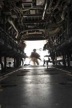 Marines with 2nd Battalion, 1st Marine Regiment (Reinforced), quickly board an MV-22B Osprey with Marine Medium Tiltrotor Squadron (VMM) 166 (Reinforced) aboard Marine Corps Base Camp Pendleton, California, Aug. 18.  Marines conducted egress training as part of the 13th Marine Expeditionary Unit predeployment training. (U.S. Marine Corps photo by Sgt. Lillian Stephens/Released)