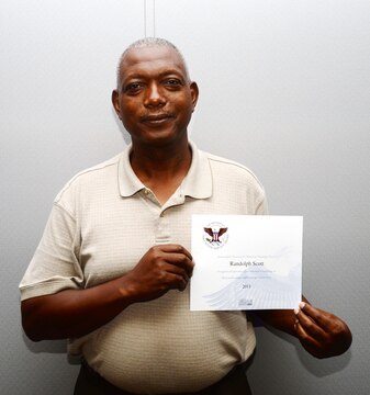 Retired Marine Master GySgt. Randolph Scott, project administrator, Marine Corps Systems Command, displays his 2013 President’s Volunteer Service Award, while awaiting official presentation of his 2014 award. Scott, who has earned a total of six commendations from President Barak Obama, was nominated to receive the Registered Adult Volunteer of the Year Award by Mayor Dorothy Hubbard, Albany, Ga., recently. Each of the awards recognized Scott for his “outstanding” volunteer service to children, the community as well as to veteran service members.
