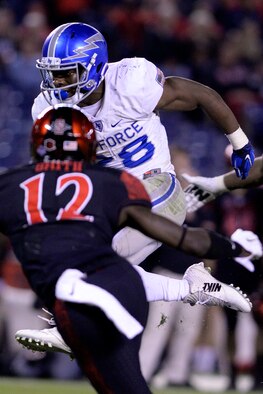 Jacobi Owens, a U.S. Air Force Academy Falcons running back, runs with the ball against San Diego State in San Diego, Dec. 4, 2015. Air Force lost to San Diego State 27-24. (U.S. Air Force photo/Mike Kaplan)
