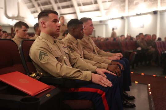 The distinguished graduates of Corporals Course 2-16 sit in the front row in acknowledgment of their awards aboard Marine Corps Air Station Miramar, California, Dec. 10. Corporals Course, a professional military education program hosted by 3rd Marine Aircraft Wing, is a re-introduction of the basic Marine Corps values to noncommissioned officers.(U.S. Marine Corps photo by Lance Cpl. Harley Robinson/Released)