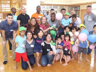 NAGO, Okinawa, Japan – Marines from Combat Assault Battalion, 3rd Marine Division, spend the day with local children at Asunaro Nursery School during the Single Marine Program Volunteer opportunity at the school Nov. 12, 2015. The Marines of CAB routinely volunteer in the local communities of Henoko and Nago, Okinawa.
