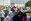 Santa Claus hugs children when he arrives for the event, Santa’s Little Helper, on Camp Hansen, Okinawa, Japan, Dec. 12, 2015. The event also had Santa fast rope out of a helicopter, fake snow, a bouncy castle, face painting and food served. The event was hosted by Combat Assault Battalion, 3rd Marine Division, III Marine Expeditionary Force and Marine Corps Community Services. (U.S. Marine Corps photo by Cpl. Tyler S. Giguere/Released)