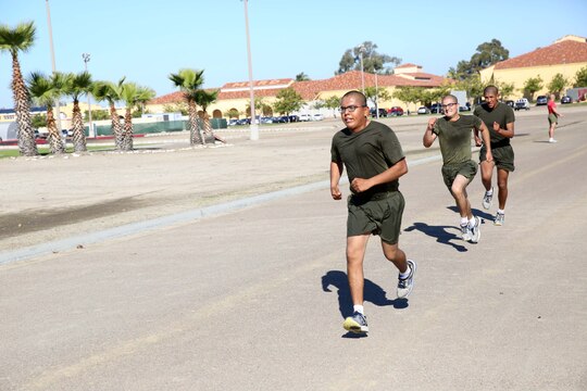 Recruit Florentino A. Buck, Platoon 1050, Charley Company, 1st Recruit Training Battalion, finishes the timed three mile run portion of the Physical Fitness Test at Marine Corps Recruit Depot San Diego, Dec. 22. Buck is Shiprock, N.M., native and was recruited out of Recruiting Substation Albuquerque, N.M.