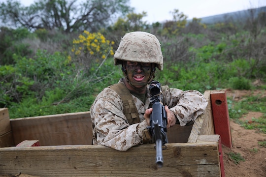 Lance Cpl. James M. Cates, Platoon 3245, Lima Company, 3rd Recruit Training Battalion, mans a fighting hole during the Basilone’s Challenge event at Edson Range, Marine Corps Base Camp Pendleton, Calif., Jan. 20. Following graduation, Cates will take on the School of Infantry in Camp Pendleton, Calif., to pursue a career as an infantryman and plans on learning as much as he can from the Marine Corps while he is enlisted. Cates is a native of Prior Lake, Minn., and was recruited out of Recruit Station Twin Cities.