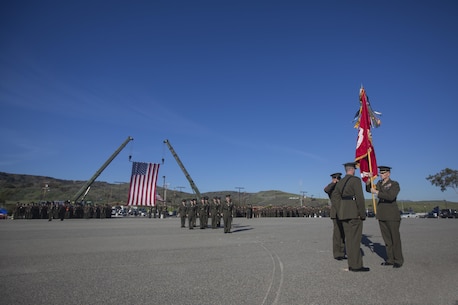 Camp Pendleton, CA – LtCol Hunter R. Rawlings assumes command of the Dark Horse, 3rd Battalion, 5th Marine Regiment, 1st Marine Division, I Marine Expeditionary Force, during a change of command ceremony aboard Marine Corps Base Camp Pendleton, CA 14 January, 2015.  LtCol Rawlings assumed command from LtCol Robert C. Rice, following the Battalion’s recent return from deployment as the Battalion Landing Team for the 31st Marine Expeditionary Unit . Here the outgoing and incoming commanders transfer the Battalion Colors in the presence of the Battalion Sergeant Major, Sergeant Major Carlos Ruiz.