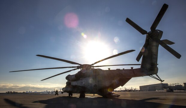 Air crew with Marine Heavy Helicopter Squadron (HMH) 466, the “Wolfpack,” conduct preflight checks for a CH-53E Super Stallion aboard Marine Corps Air Station Miramar, California, July 2. The aircrew prepares the aircraft for night fast-rope training at Marine Corps Base Camp Pendleton, California. (U.S. Marine Corps photo by Sgt. Lillian/Released)