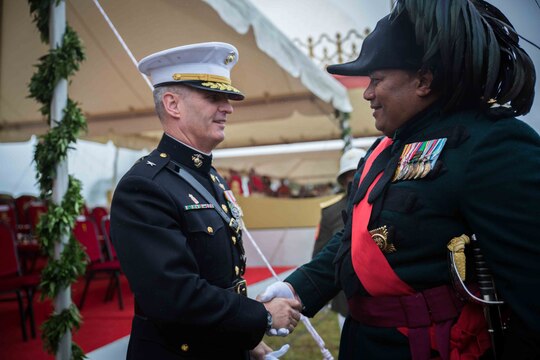 Brig. Gen. Christopher Mahoney, deputy commander, U.S. Marine Corps Forces, Pacific, shakes hands with Brig. Gen. Hon Fielakepa, chief commander, His Majesty's Armed Forces, after the King's coronation celebration in Nuku'alofa, Tonga, July 6, 2015. The U.S. cultivates a strong partnership with Tonga through participation in significant cultural and ceremonial events.