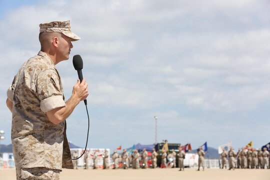 Col. William Swan, commanding officer of Marine Aircraft Group (MAG) 11, addresses Marines, Sailors, family members and friends during his change of command ceremony aboard Marine Corps Air Station Miramar, California, July 10. Swan succeeded Col. Rick Uribe as the new commanding officer for MAG-11. (U.S. Marine Corps photo by Sgt. Lillian Stephens)