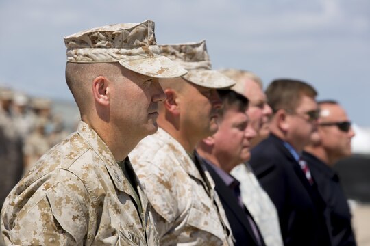 Col. William Swan, commanding officer of Marine Aircraft Group (MAG) 11, right, stands beside Col. Rick Uribe, retired Lt. Gen. Terry Robling, retired Col. Jim Collins, retired Col. Earl Wederbrook, and retired Col. Eric Fippinger, former commanding officers of MAG-11. Uribe commanded MAG-11 from June 28, 2013 to July 10, 2015, and will continue his career at Headquarters Marine Corps, Washington, D.C. (U.S. Marine Corps photo by Sgt. Lillian Stephens)