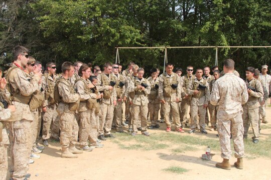 MARINE CORPS BASE QUANTICO, Va. - High school students participating in the Summer Leadership and Character Development Academy are briefed on their mission before going on patrol at the Basic School, Aug. 8. The SLCDA is a weeklong course designed to teach Marine Corps leadership skills, personal character and ethics to the next generation of leaders.