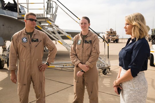 1st Lt. Bryan Boer and 1st Lt. Emily Favorite, F/A-18 pilots with Marine Fighter Attack Training Squadron (VMFAT) 101, talk with Bridget Naso, a military reporter with NBC 7 Sand Diego, during the Marine Corps Air Station Miramar Media Day aboard MCAS Miramar, California, July 29. The MCAS Miramar Media Day allowed the media an opportunity to delve deeper into the moving parts that make the air station and the Marine Corps work. (U.S. Marine Corps photo by Cpl. Alissa P. Schuning/Released)