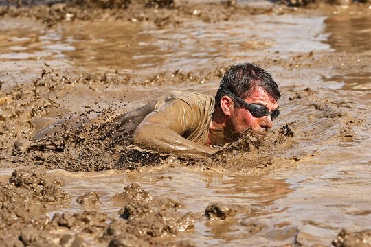 More than 6,000 racers participated in the opening day of the 2015 World Famous Mud Run here, June 6. The Mud Run, open to authorized military and civilian participants, includes a 10k and a 5k option with hills, tire obstacles, river crossings, two 5-foot walls with mud on both sides, a tunnel crawl, a cargo net climb and a final 30-foot long mud pit. The series will also have a 1k kids’ Mud Run for children ages 4 to 12.
