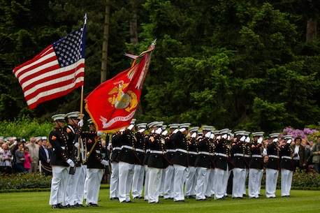 U.S. Marines from the 1st Marine Division and their French counterparts gather at Aisne-Marne American Cemetery to commemorate their fallen heroes in Belleau, France on May 31, 2015. This Memorial Day ceremony was held in honor of the 97th anniversary of the Battle of Belleau Wood. (U.S. Marine Corps photo by Lance Cpl. Akeel Austin/Released)