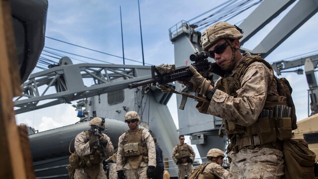 U.S. Marines with Kilo Company, Battalion Landing Team 3rd Battalion, 1st Marine Regiment, 15th Marine Expeditionary Unit, rehearse urban operation tactics aboard USS Rushmore at sea in the Pacific Ocean, June 1, 2015. BLT 3/1 constantly trains for the unknown in order to respond to the needs of the MEU while deployed. These drills keep the Marines in a constant state of combat readiness while at sea.