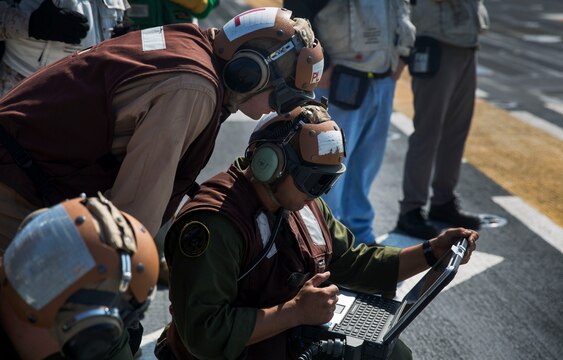 Marines aboard the USS Wasp (LHD-1) preform engine tests on the F-35B Lightning II during F-35B operational testing, May 20, 2015. Data and lessons learned from OT-1 will be the groundwork for future F-35B operations and deployments aboard Navy amphibious ships. (U.S. Marine Corps photo by Lance Cpl. Remington Hall/Released)