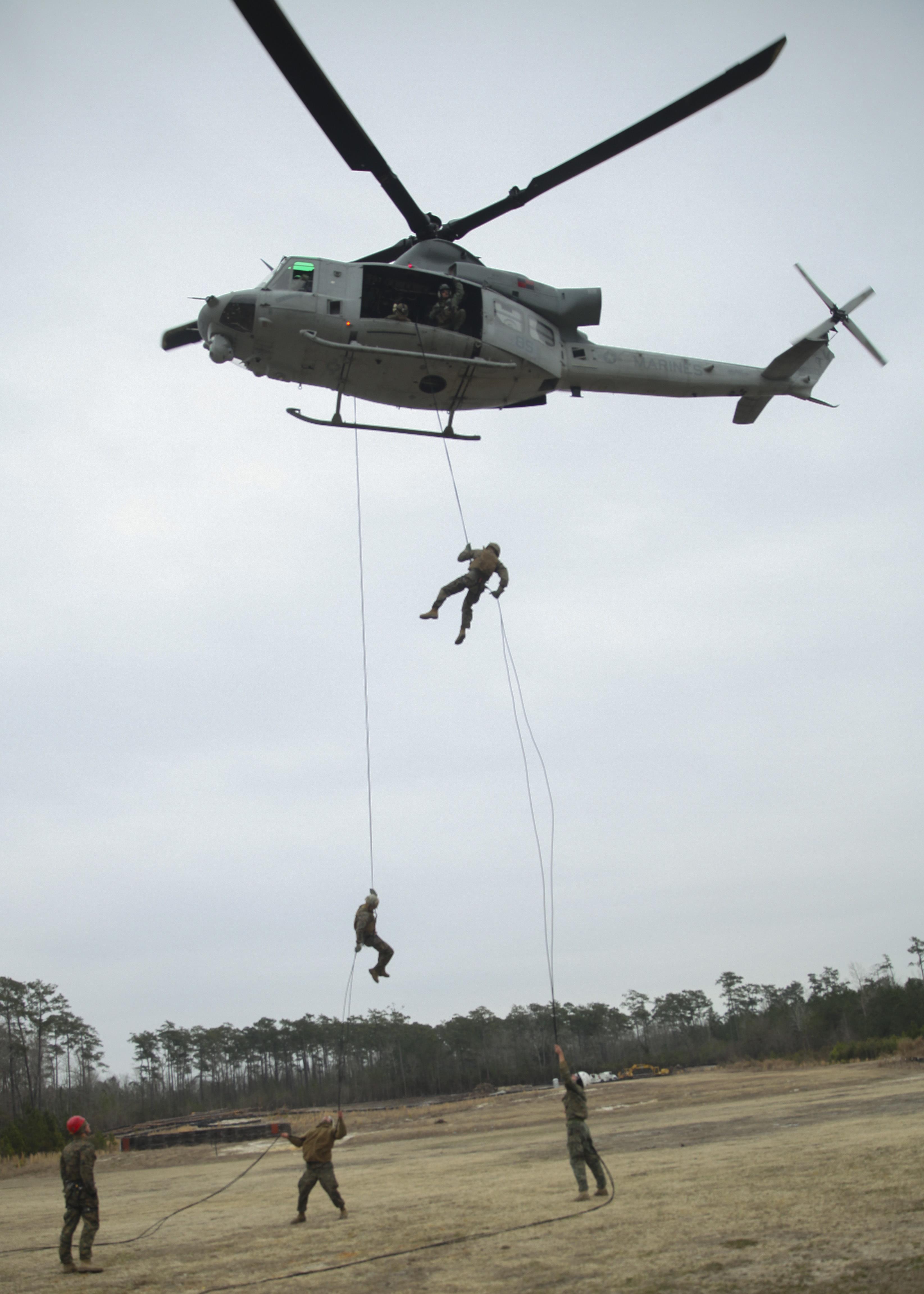 Marines learn to master the ropes during helicopter suspension