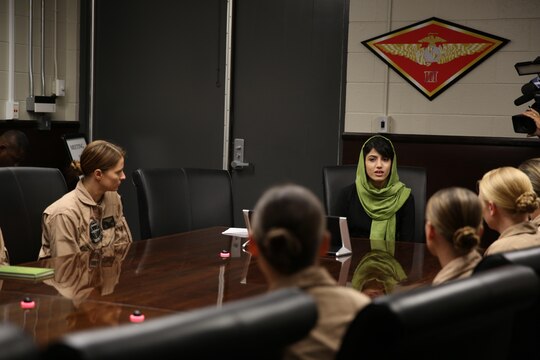 Captain Niloofar Rahmani, the first female fixed-wing pilot in the Afghan Air Force, speaks with female pilots who each fly different aircraft aboard Marine Corps Air Station Miramar, Calif., March 9. Rahmani received the 2015 International Women of Courage award by the Department of State for her courage in advocating women’s rights despite personal risk.